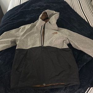 Full Zip North Face rain jacket! Size Medium. Barely worn practically new